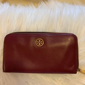 Tory Burch continental wallet in purple/ maroon